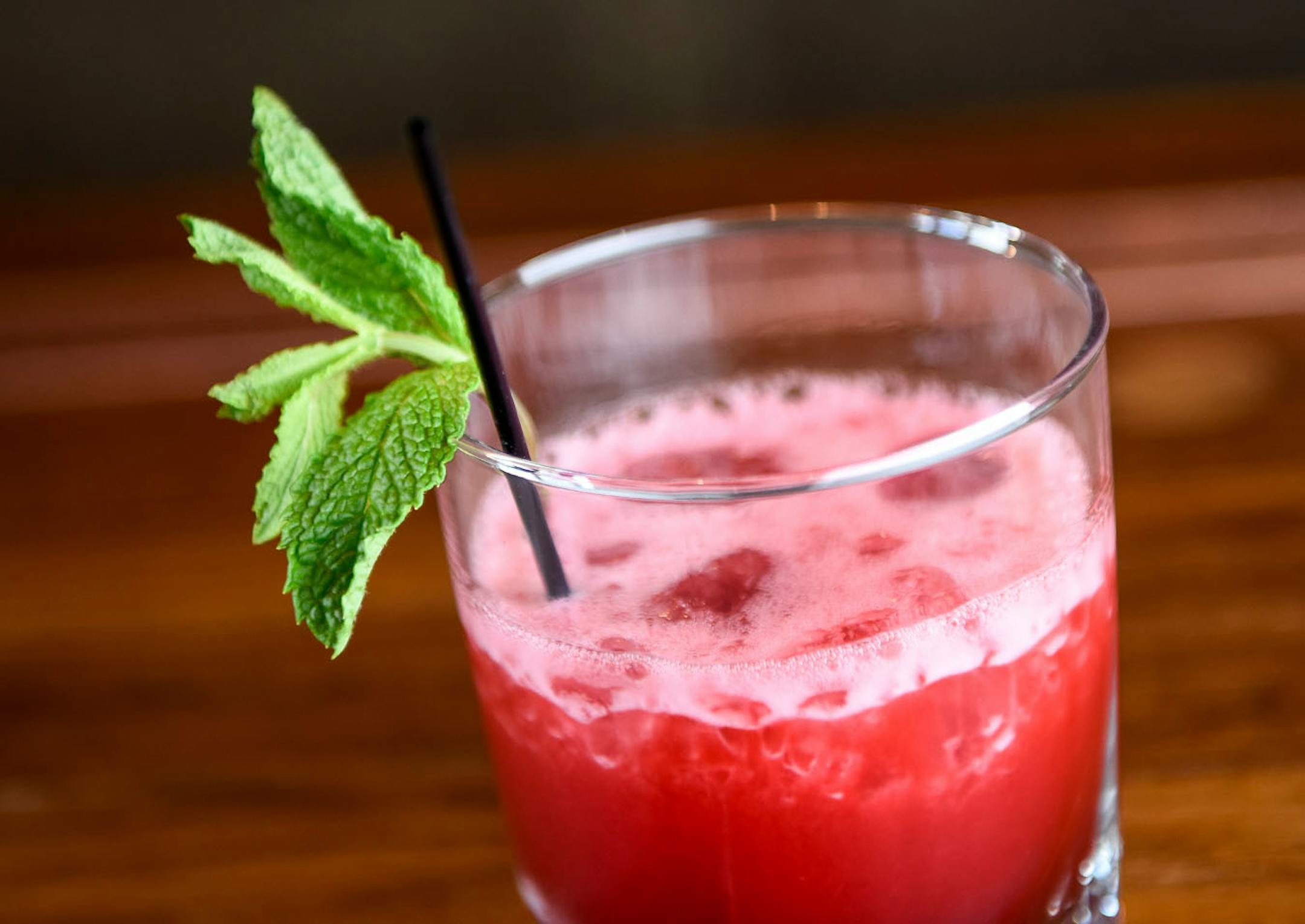 Vikre Distillery's "Bramble On" with Hay and Sunshine whiskey, blackberry rhubarb syrup, lemon and mint.