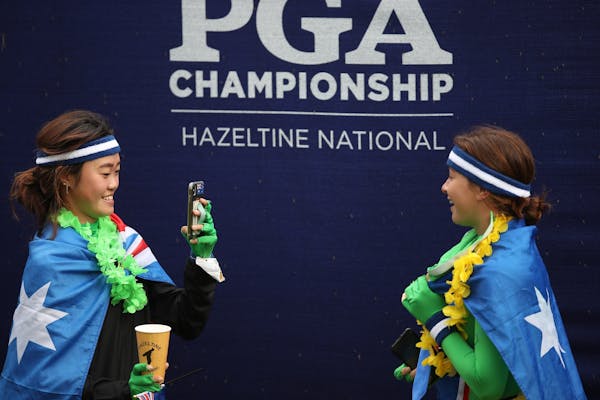 Grace Kim left took a photo of her friend Becky Kay, the two ladies were at the 9th green to greet Hannah Green who shot a 68 at Hazeltine National Go