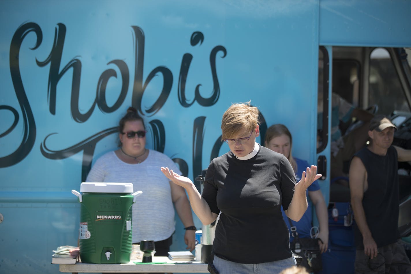 Pastor Margaret Kelly and members of the church community gathered for a service at Shobi's Table a food truck Thursday July 6, in St. Paul, MN. ] JERRY HOLT &#xef; jerry.holt@startribune.comcom