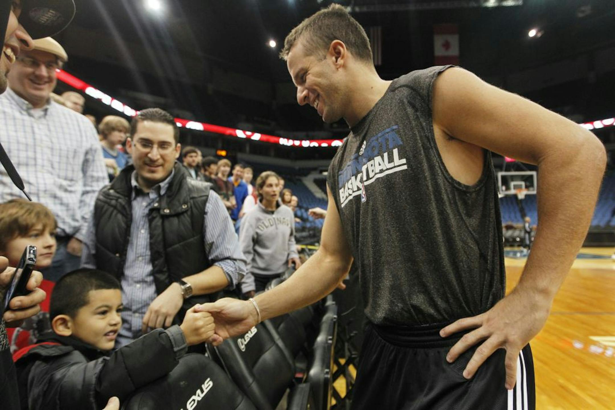 Jose Barea shook the hand of young fan Rody Jay.