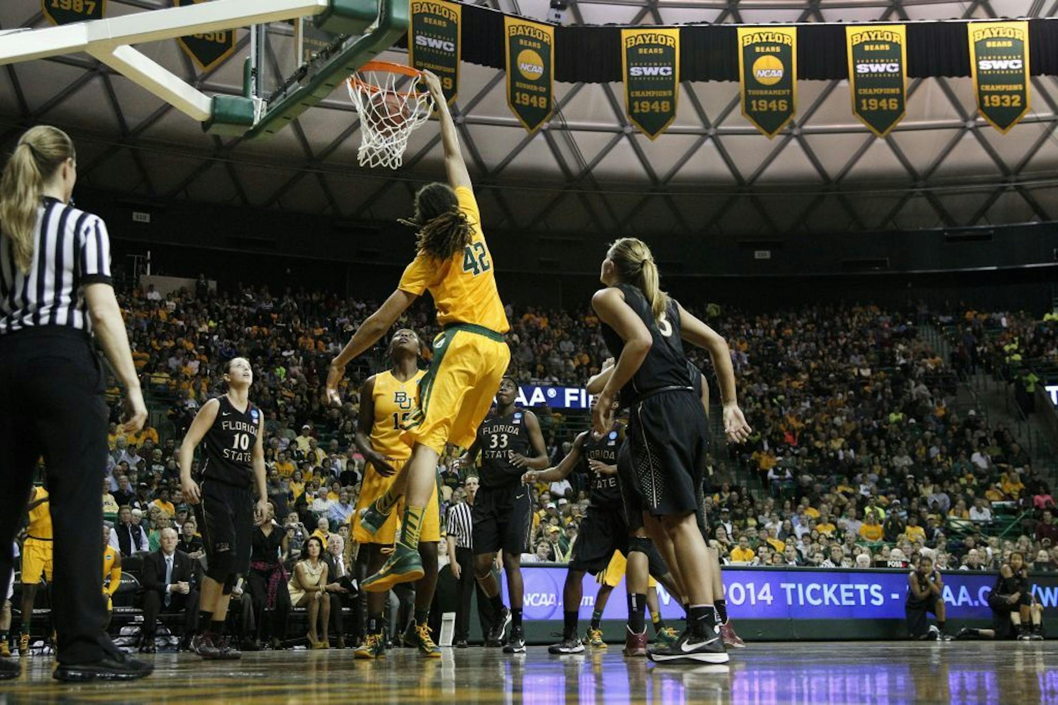 Baylor's Brittney Griner (42) dunks