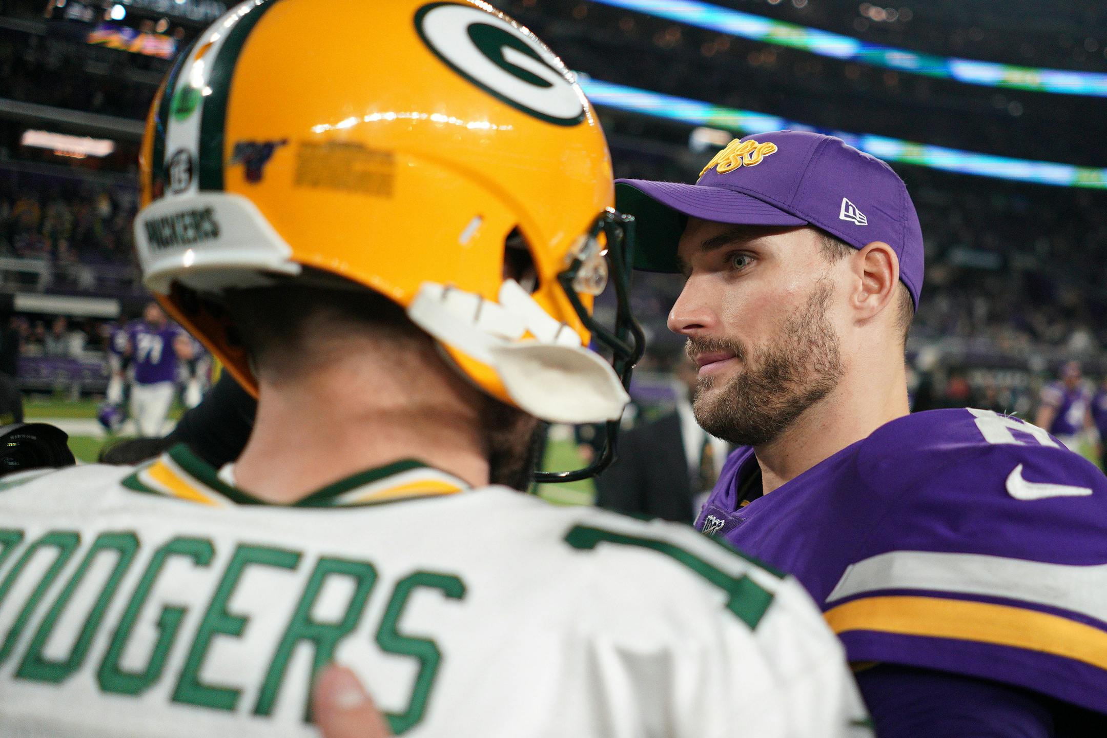 A wide eyed Minnesota Vikings quarterback Kirk Cousins (8) greeted Green Bay Packers quarterback Aaron Rodgers (12) after Monday night's loss. ] ANTHONY SOUFFLE • anthony.souffle@startribune.com The Minnesota Vikings played the Green Bay Packers in an NFL game Monday, Dec. 23, 2019 at U.S. Bank Stadium in Minneapolis. ORG XMIT: MIN1912232250251139 ORG XMIT: MIN2001032025430726