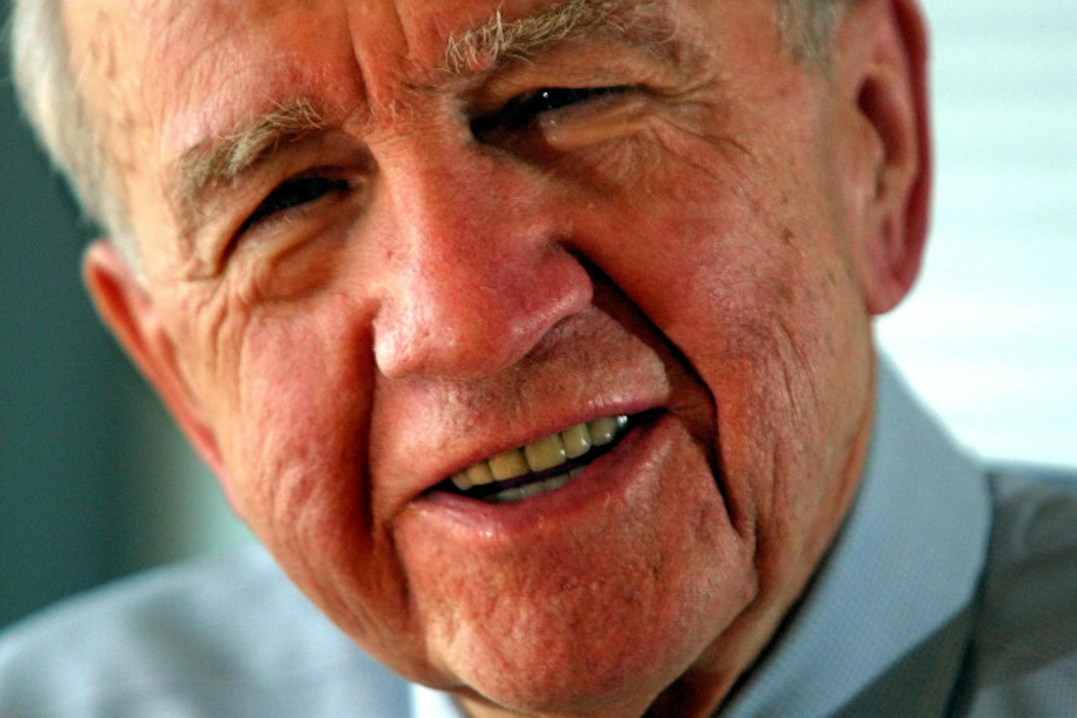 Carl Pohlad answers questions about the sale of Marquette banks to Wells Fargo.