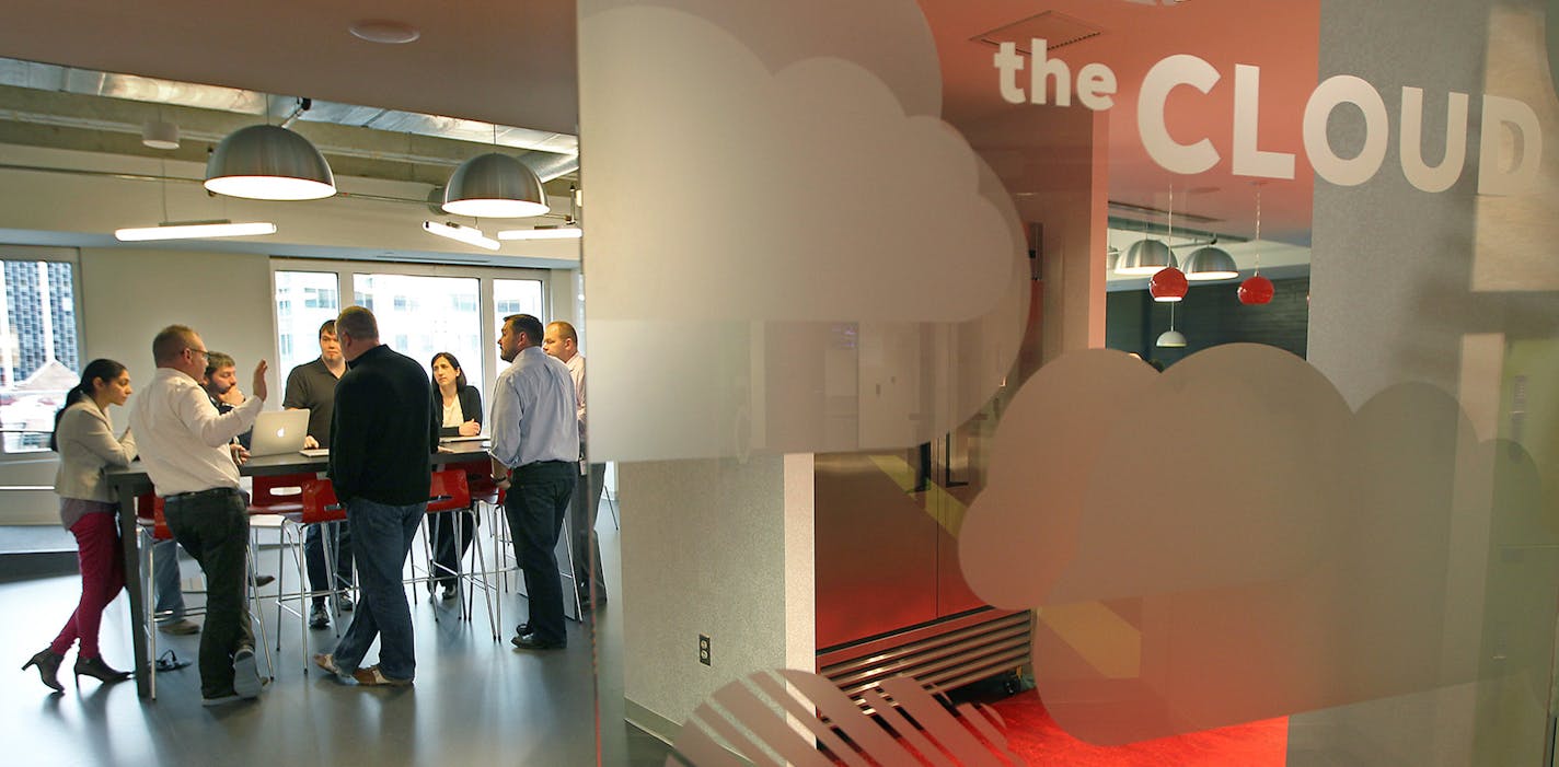 SPS Commerce employees met for a meeting in the &#x201c;Cloud&#x201d; room in downtown Minneapolis.