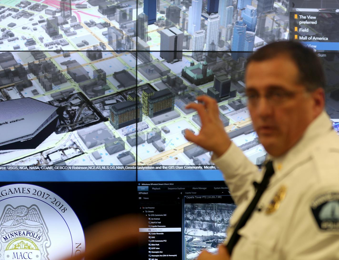 The Multi-Agency Command Center (MACC) sits in a secret location near U.S. Bank Stadium and houses local, state and federal law enforcement agencies with about 80 folks in the room. Here, Minneapolis police Cmdr. Bruce Folkens led reporters earlier this week on a tour with a giant video monitoring board.