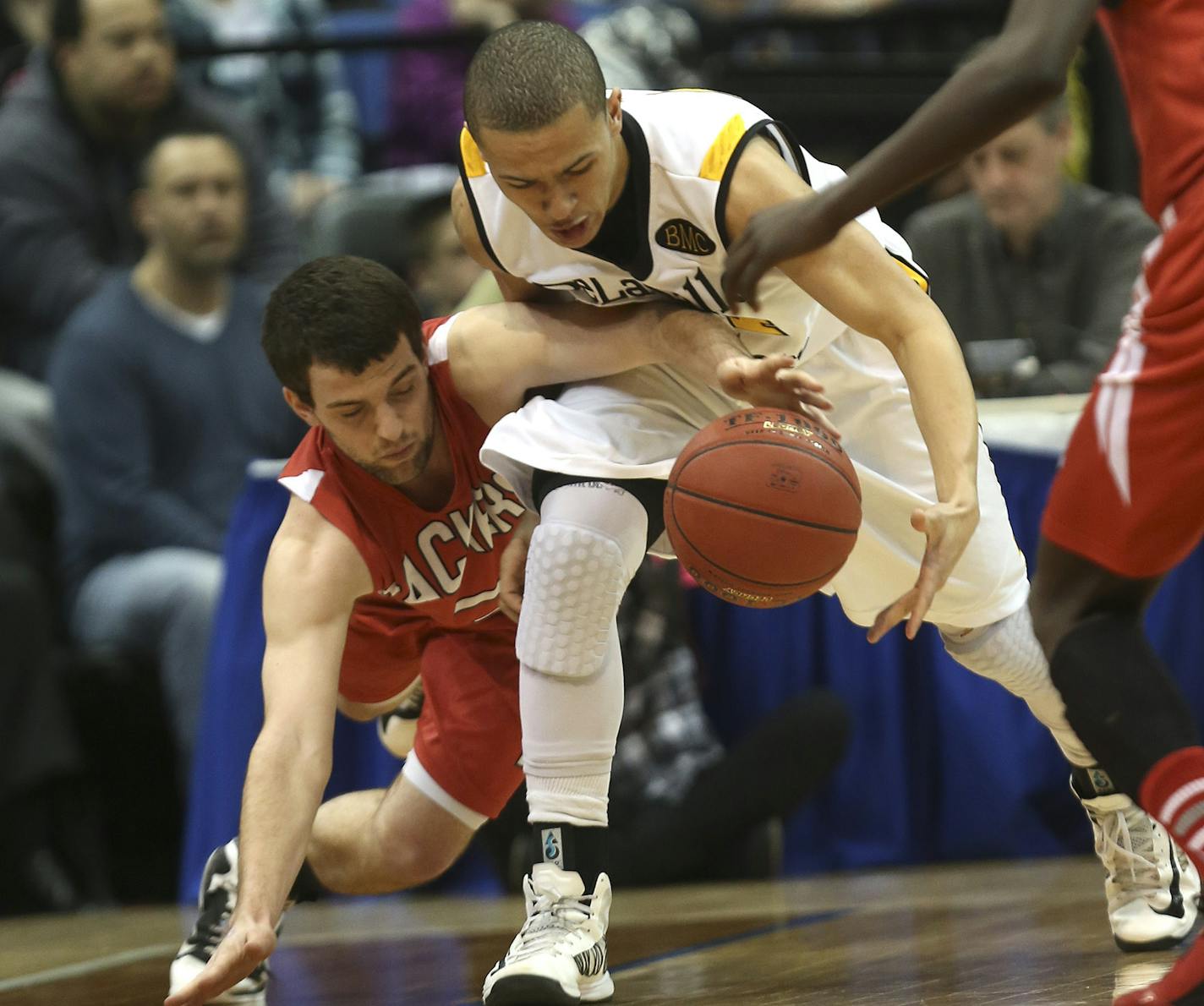 DeLaSalle's Trey Shepherd fought for a loose ball with Austin's Collin Weisert during the first half of the class 3A championship at the Target Center in Minneapolis, Min., Saturday, March 23, 2013. ] (KYNDELL HARKNESS/STAR TRIBUNE) kyndell.harkness@startribune.com