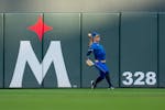 Minnesota Twins right fielder Max Kepler (26) throws a ground ball back towards first base after a Houston Astros hit in the second inning.