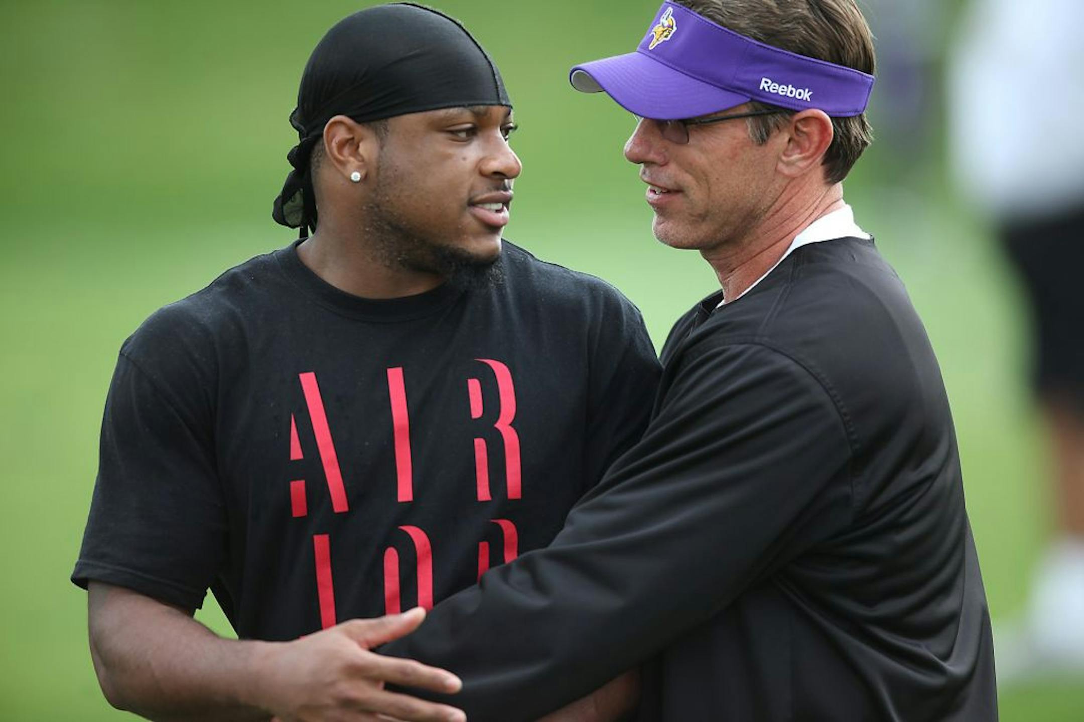 Percy Harvin and Rick Spielman in October 2012.