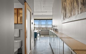 The first thing Gregory Gestner saw upon entering the condominiums was a "wall of windows" looking out over Minneapolis.