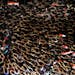 Egyptian protesters wave their hands and hold national flags during anti-President Mohammed Morsi demonstration in Tahrir Square, the focal point of E