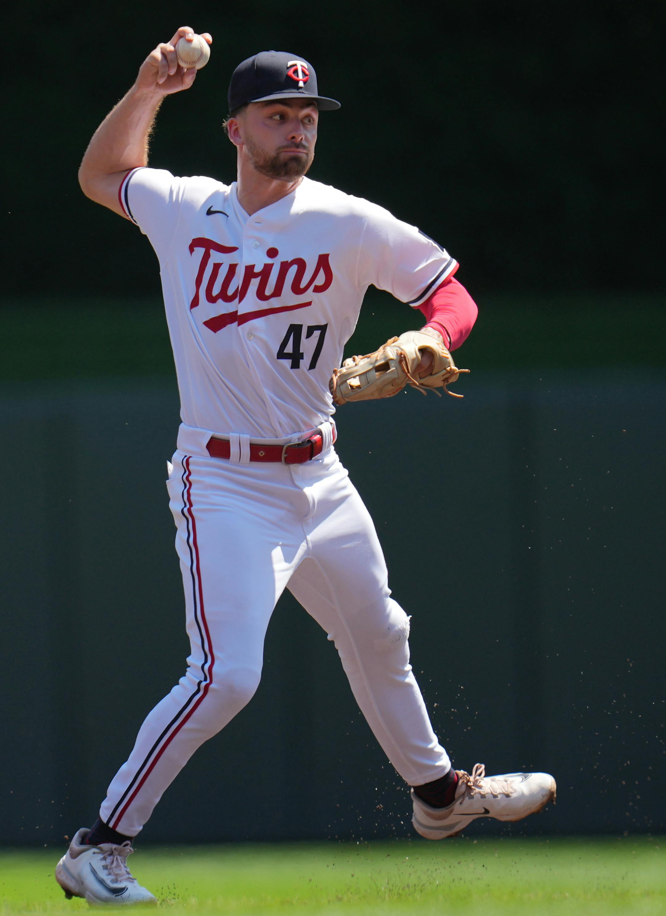 Minnesota Twins second baseman Edouard Julien (47) throws out Seattle Mariners catcher Tom Murphy (2) on a ground ball in the second inning.