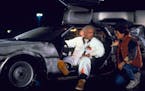 FILE - This file photo provided by Universal Pictures Home Entertainment shows Christopher Lloyd, left, as Dr. Emmett Brown, and Michael J. Fox as Mar