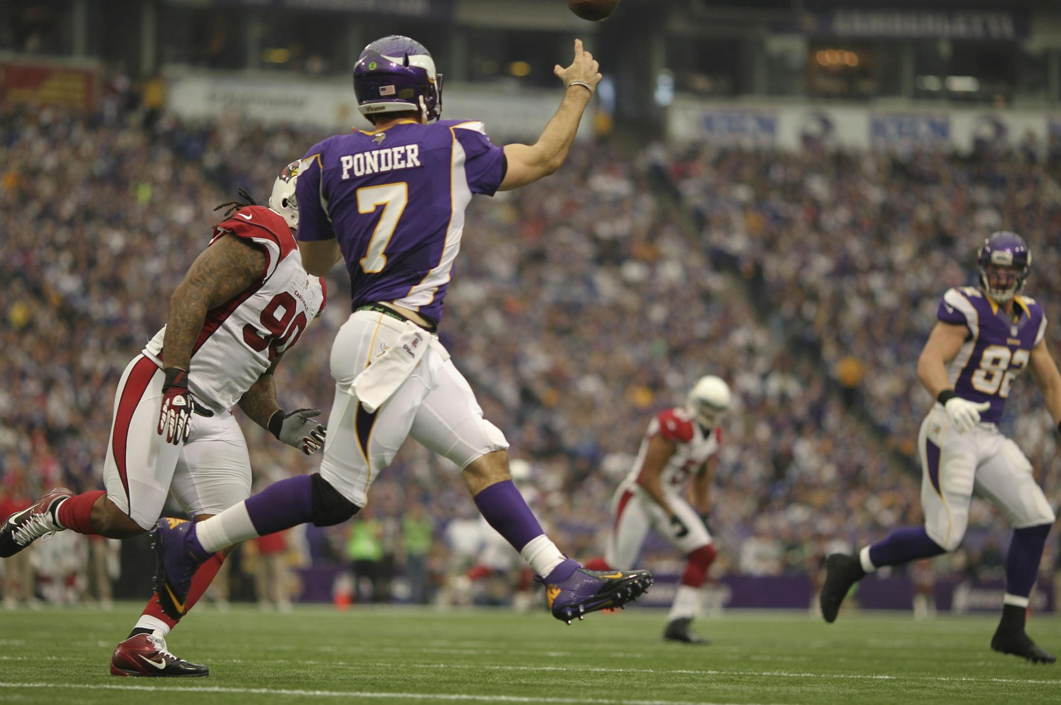 The Minnesota Vikings beat the Arizona Cardinals 21- 14 in an NFL game October 21, 2012 at Mall of America Field in Minneapolis, Minn. Vikings' quarterback Christian Ponder intended to throw to Kyle Rudolph, right, but the pass was picked off by Arizona's Paris Lenon, rear, on the first play of the second quarter.