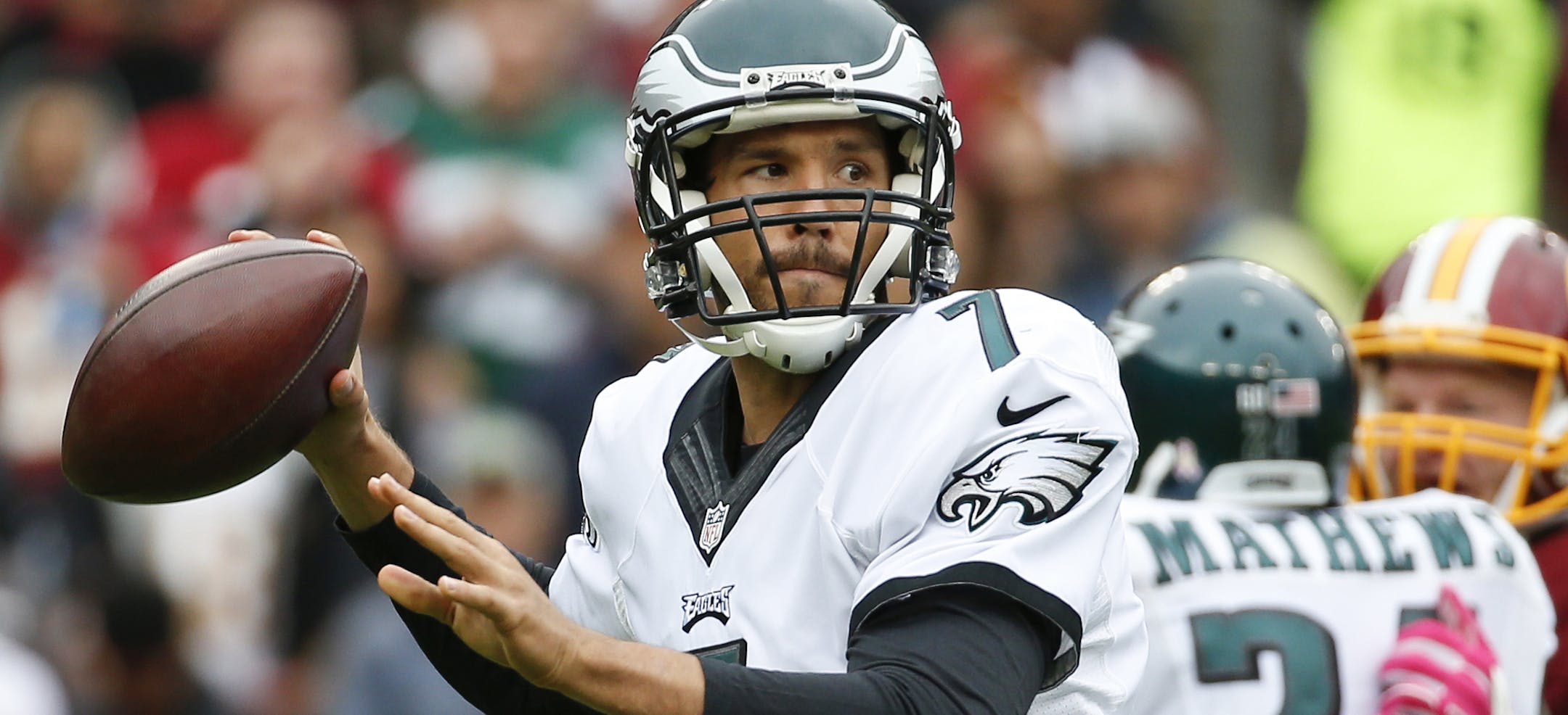 Philadelphia Eagles quarterback Sam Bradford (7) passes the ball during the first half of an NFL football game against the Washington Redskins in Landover, Md., Sunday, Oct. 4, 2015. (AP Photo/Alex Brandon)