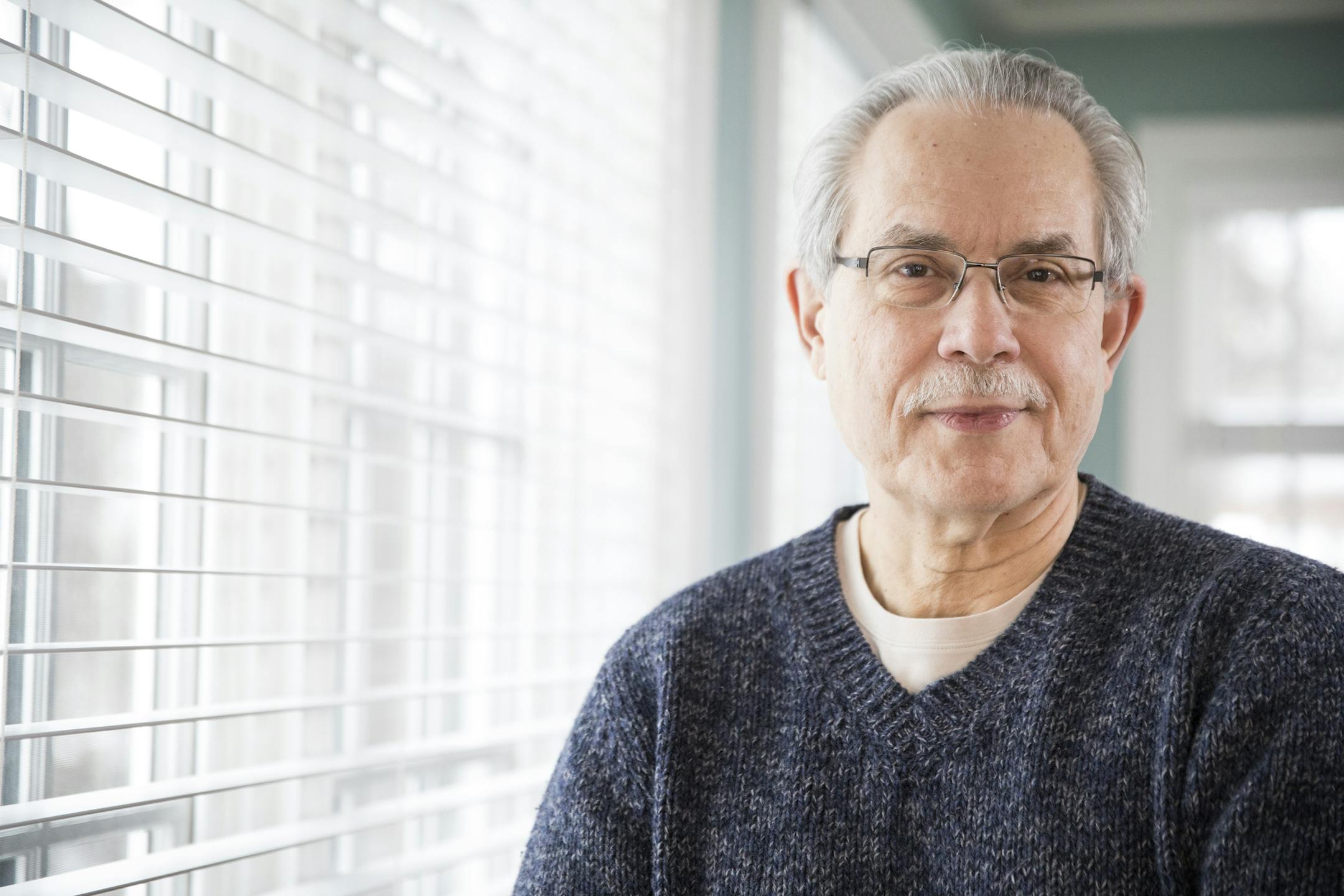 Greg Russ is the new Minneapolis Public Housing Authority director. ] (Leila Navidi/Star Tribune) leila.navidi@startribune.com BACKGROUND INFORMATION: Greg Russ, the new Minneapolis Public Housing Authority director, poses for a portrait in his Minneapolis home on Friday, December 23, 2016.