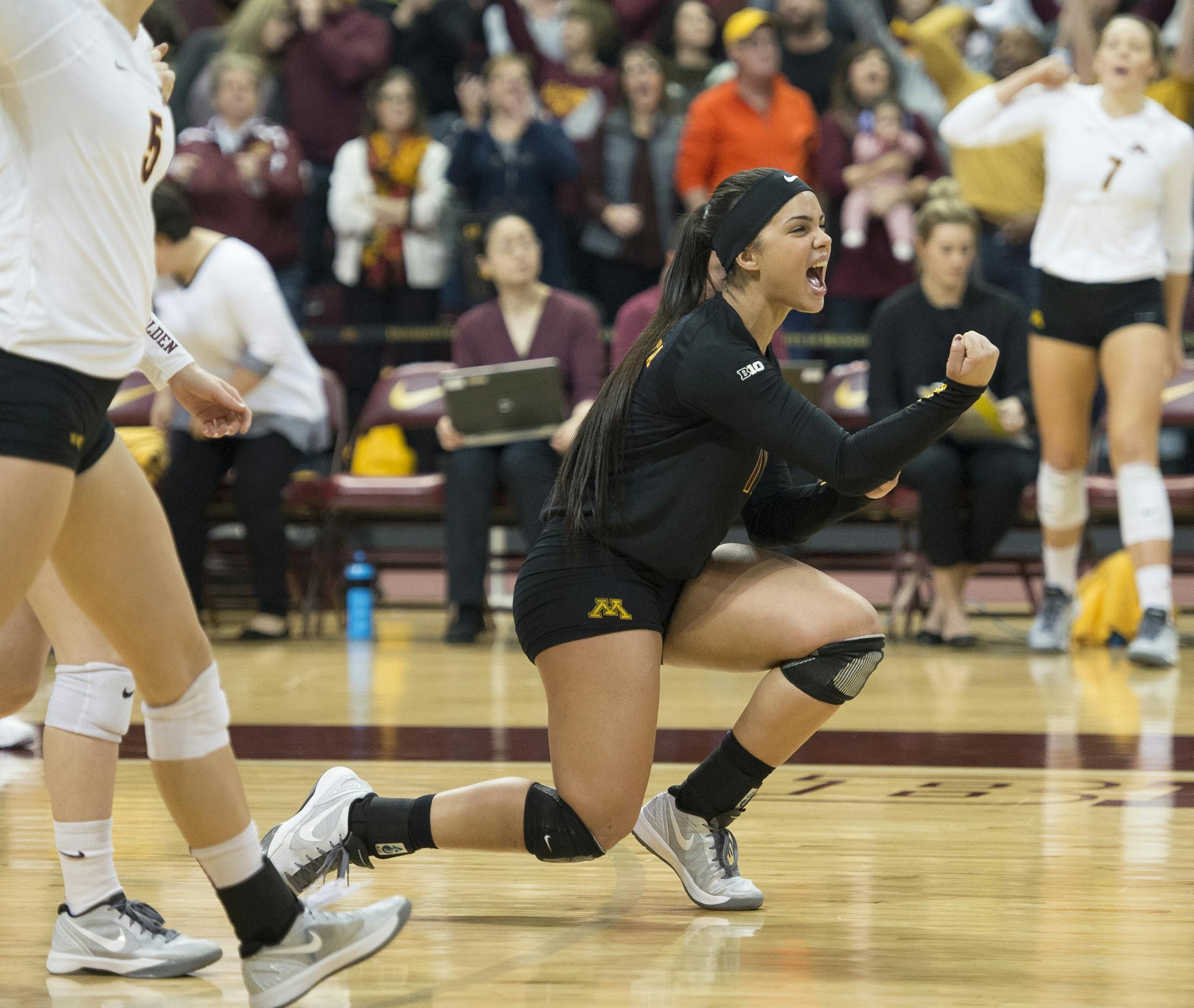 Minnesota libero Dalianliz Rosado (17) celebrated with teammates after Minnesota beat Marquette 25-23 in the first set Saturday. ] (AARON LAVINSKY/STAR TRIBUNE) aaron.lavinsky@startribune.com The University of Minnesota Golden Gophers women’s volleyball team played Marquette in the second round of the NCAA tournament on Saturday, Dec. 5, 2015 at the University of Minnesota Sports Pavilion in Minneapolis, Minn.