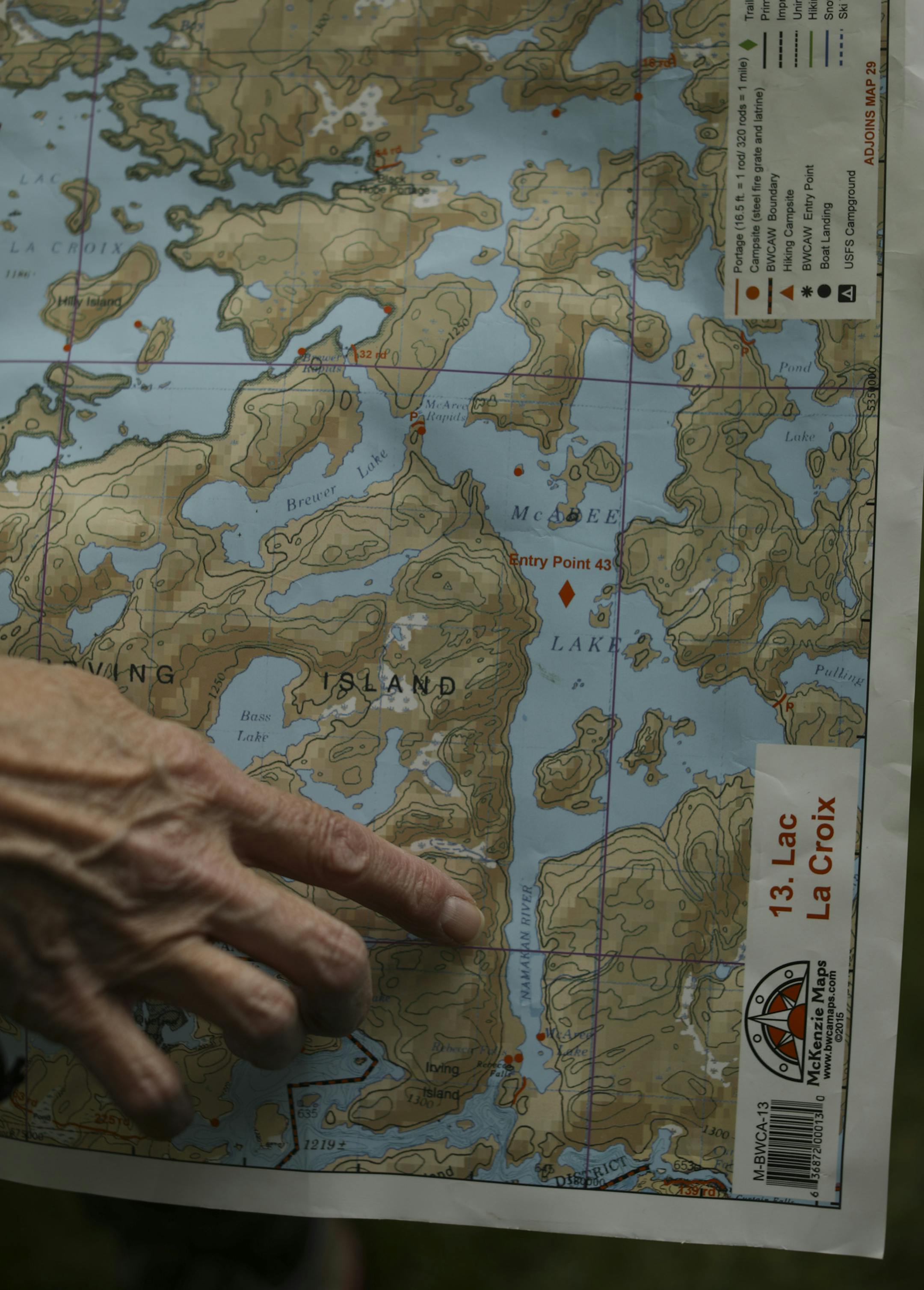 Jane Stark showed on a map where they will begin their trip in Canada's Quetico Provincial Park. ] JEFF WHEELER ï jeff.wheeler@startribune.com Six women who have known each other for years through their book club are going to try a canoe trip together in Canada's Quetico Provincial Park next month. Wednesday evening, May 24, 2017 they gathered at the home of one of their members, Pat Aubrecht, for a portrait. They all have camping experience, but only Allar has been canoe camping before.