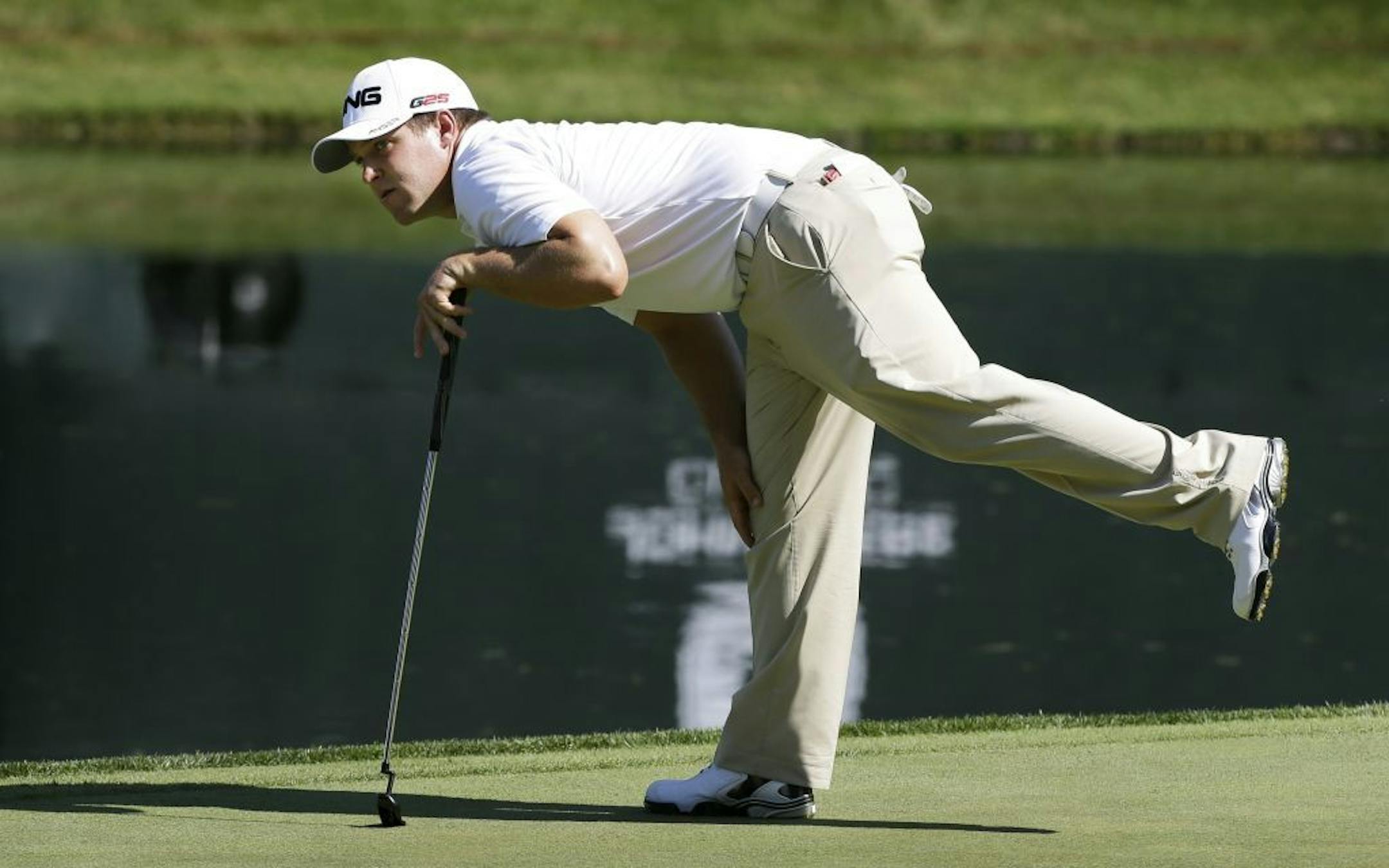 Daniel Summerhays watches his putt on the 18th green during the third round of the John Deere Classic golf tournament at TPC Deere Run, Saturday, July 13, 2013, in Silvis, Ill.