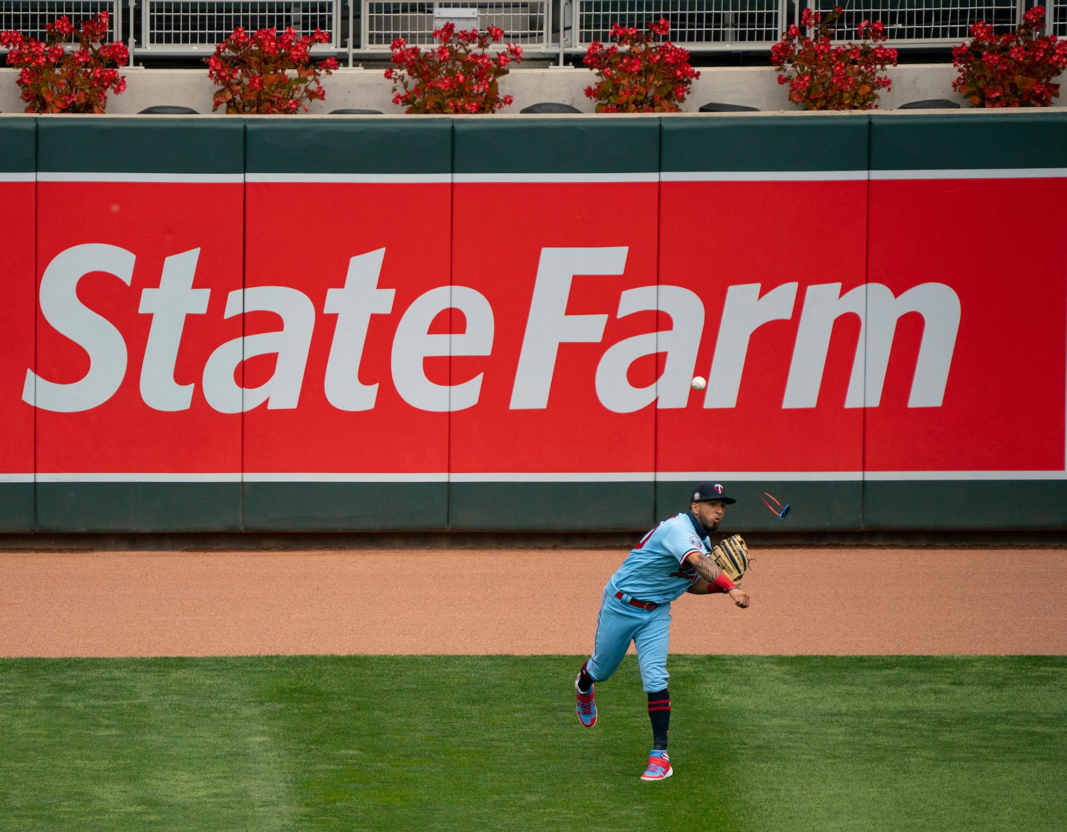 Minnesota Twins left fielder Eddie Rosario (20) played a fly ball by Cleveland designated hitter Francisco Lindor off the wall and then threw him out at second base trying to stretch his hit into a double in the fourth inning.