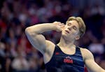 Shane Wiskus reacts to the crowd after competing on the floor during the U.S. Gymnastics Olympic Trials at Target Center in Minneapolis, Minn., on Thu