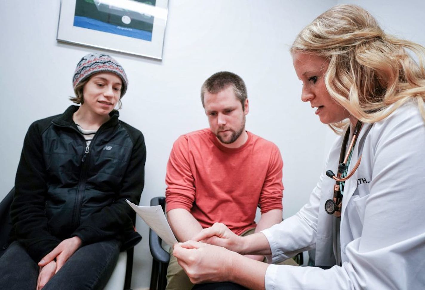 Nurse practitioner Hannah Balfanz went over the results of Sam Talbot's physical exam at the University of Minnesota Nurse Practitioners Clinic. Talbot was there with girlfriend Kate Meyer.