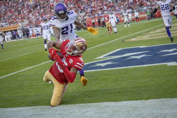 Vikings cornerback Bashaud Breeland (21) put pressure on 49ers wide receiver Jauan Jennings (15) as he caught a pass in the end zone in the third quar