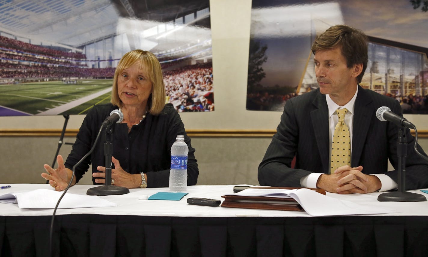 Michele Kelm-Helgen ( left) chairman of MN Sports Facilities Assoc and Peter Carter, ( right) attorney with Dorsey and Whitney spoke about the probe of 'due dilligence' reagrding the Wilf's involvement in a New jersey lawsuit.