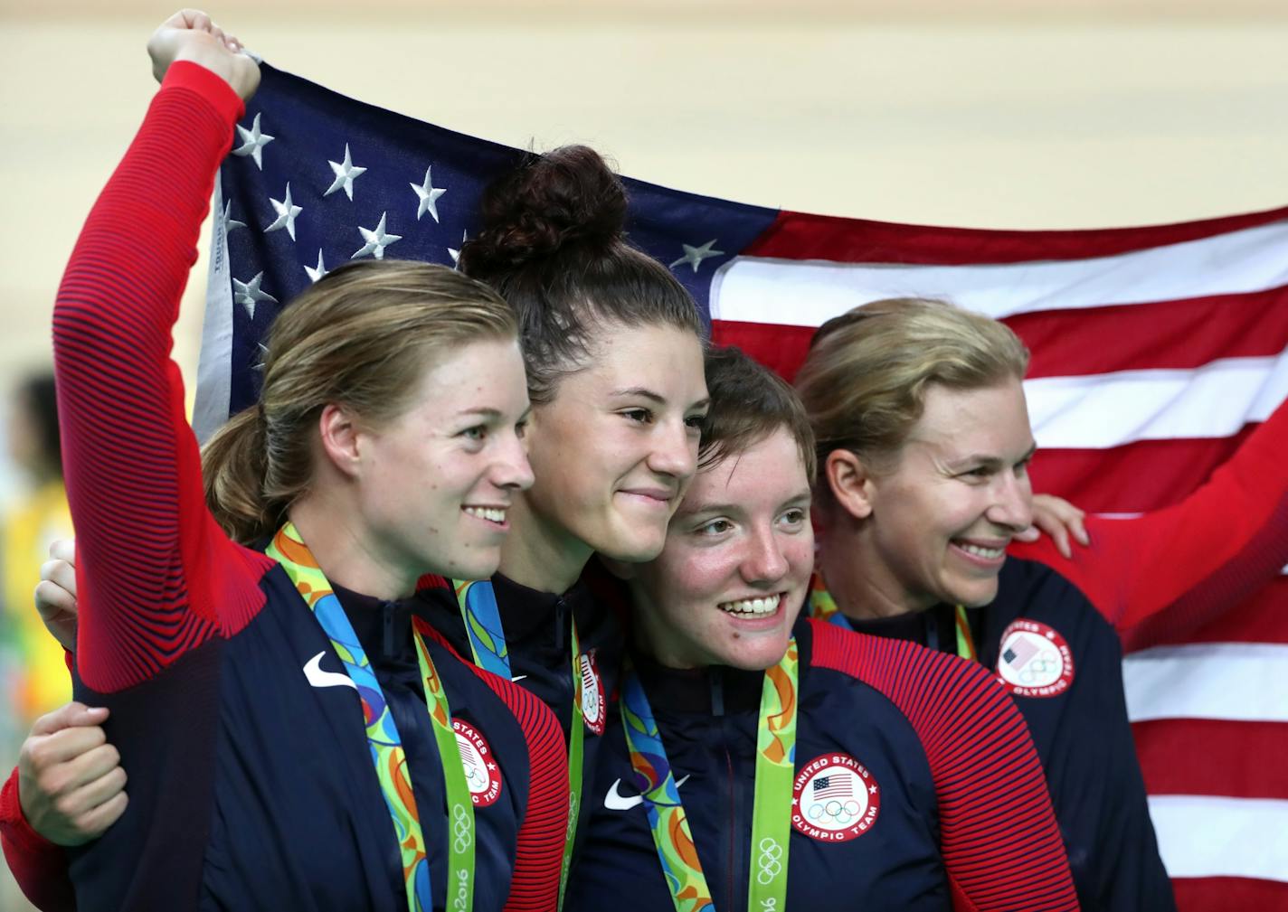 US cyclers Jennifer Valente , Chloe Dygert Kelly Catlin and Sarah Hammer earned the silver medal in women's cycling team pursuit Saturday evening at the Rio Olympic Velodrome. beaten by Great Britain in the final, the U.S. quartet posted a time of 4:12.454 while Great Britain finished in a world record time of 4:10.236, breaking the record it had set in qualifying earlier in the day.