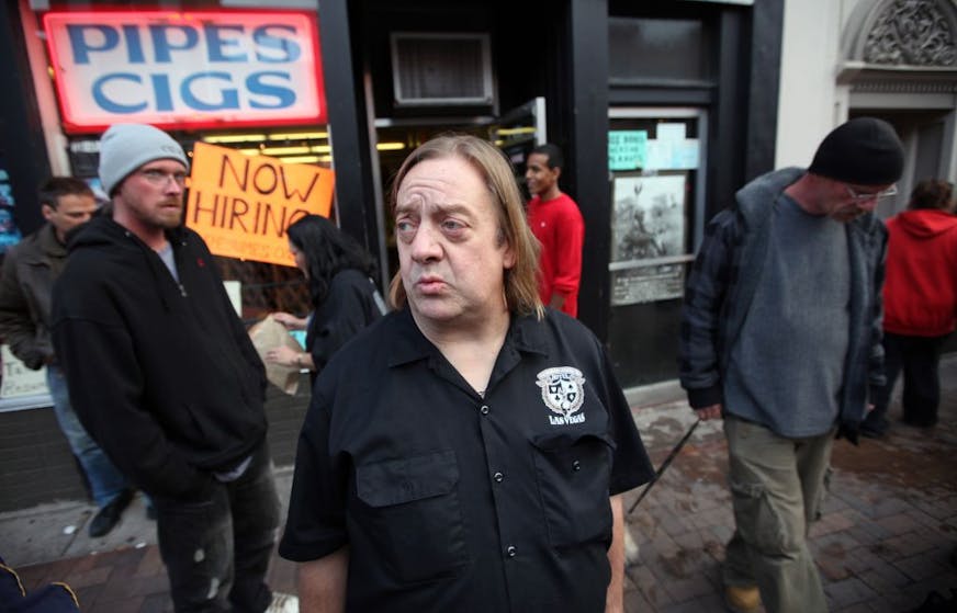 The Last Place On Earth owner Jim Carlson talked with reporters outside his head shop in Duluth that was raided by police Wednesday afternoon. Police took synthetic drugs, guns, jewlrey, cash and cameras from Carlson's store, which opened about 15 minutes after the police left the store. About 30 customers were waiting to get in.