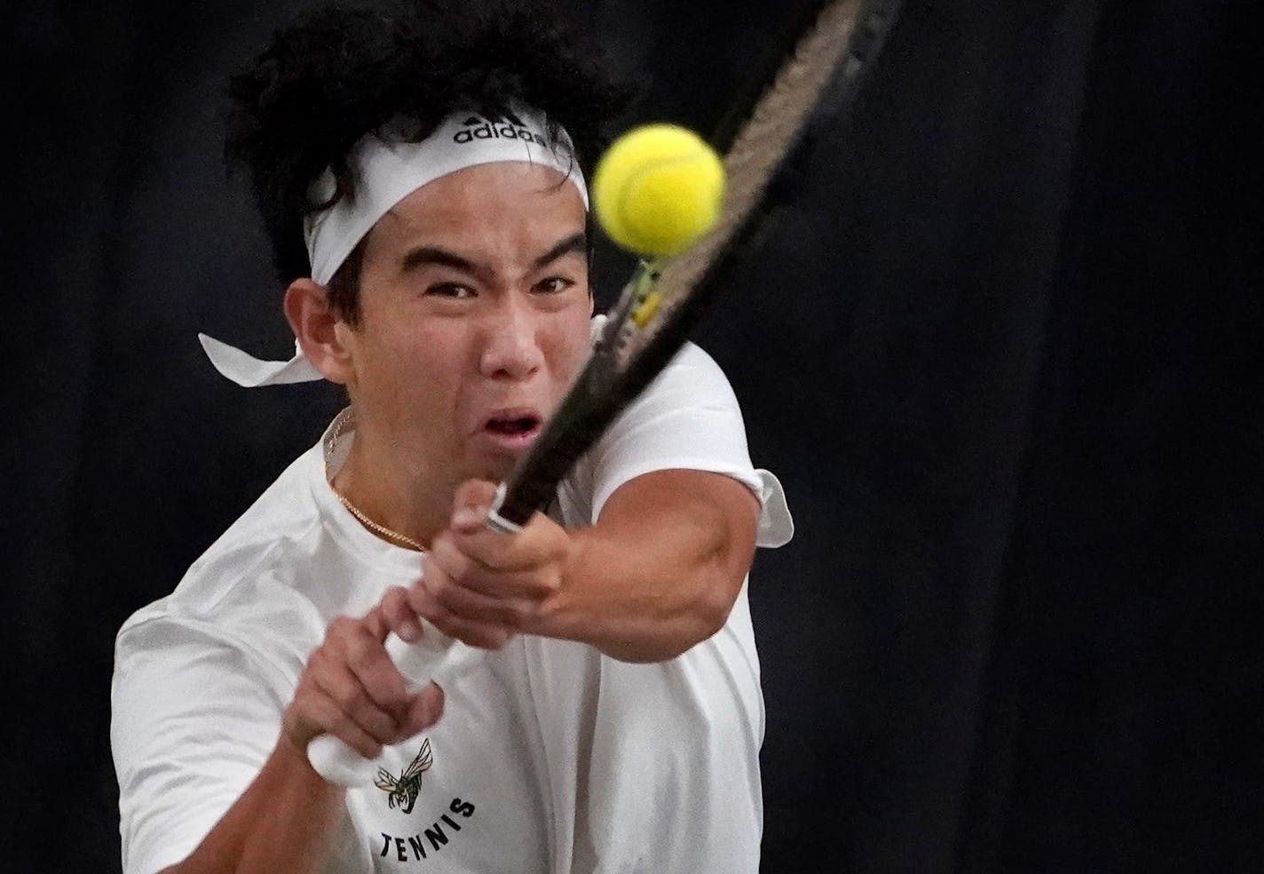 Edina junior Matthew Fullerton returns a backhand shot to Wayzata's Collin Beduhn during the Class 2A boys' individual singles state tochampionship Friday, June 10, 2022 at the University of Minnesota's Baseline Tennis Center in Minneapols, Minn.