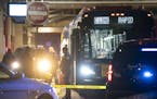 Minneapolis Police investigated the scene on the Metro Transit bus where two people were shot Thursday night.