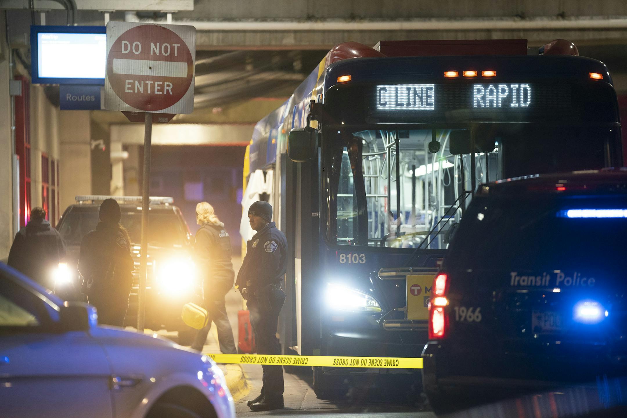 Minneapolis Police investigated the scene on the Metro Transit bus where two people were shot Thursday night.