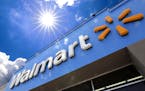 FILE - This June 25, 2019, file photo shows the entrance to a Walmart in Pittsburgh. Walmart Inc. reports financial results Thursday, Aug. 15. (AP Pho