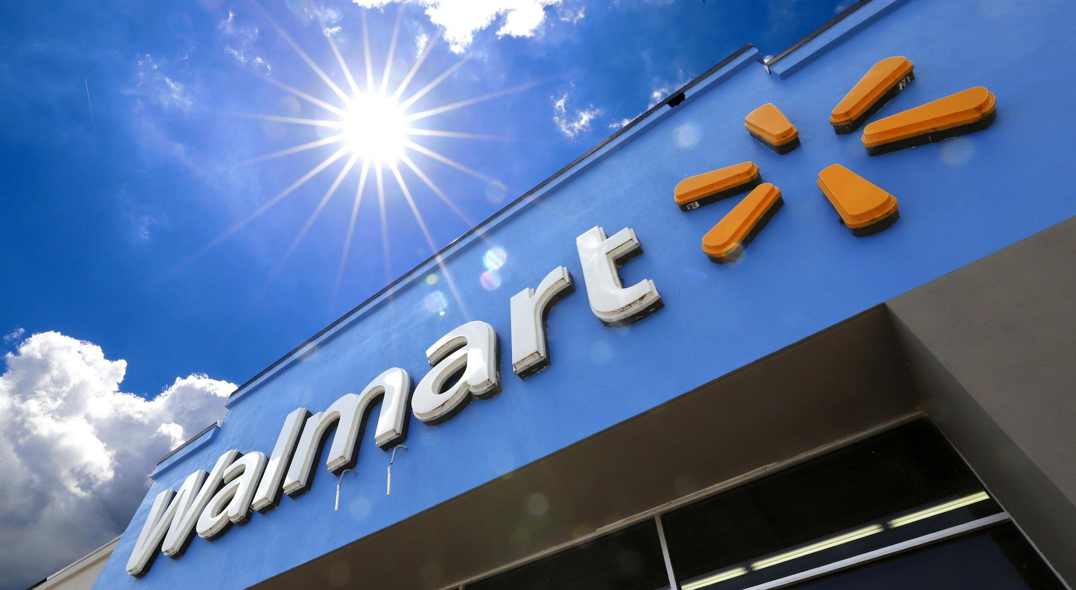 FILE - This June 25, 2019, file photo shows the entrance to a Walmart in Pittsburgh. Walmart Inc. reports financial results Thursday, Aug. 15. (AP Photo/Gene J. Puskar, File)