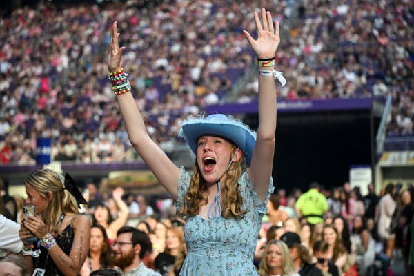 A fan cheers during the "Girl in Red" opening act Friday, June 23, 2023, at US Bank Stadium in Minneapolis.