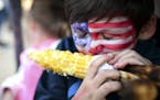Satisfaction washed over the face of 11-year old Raymon Busch, of Zimmerman, as he bit into an ear of roasted corn while visiting the state fair with 