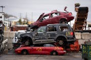 Cars were piled up in April outside the metal recycling facility at Dem-Con Companies Environmental Campus in Shakopee. 