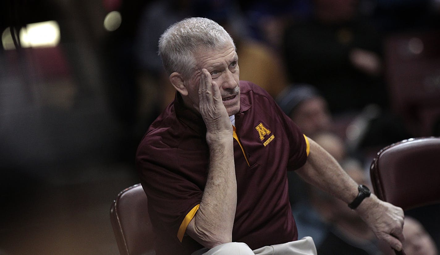 Minnesota head wrestling coach J Robinson