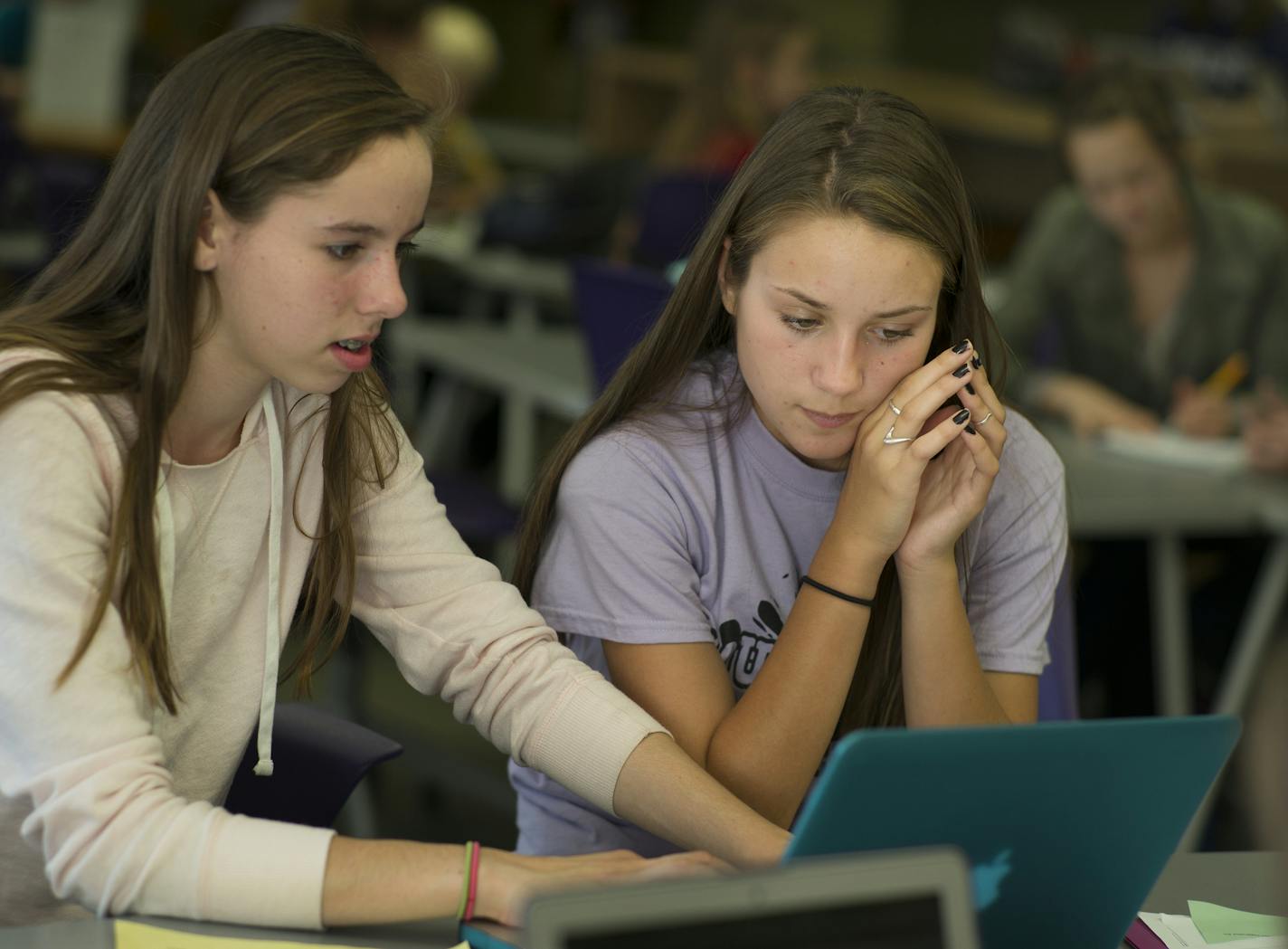 At South View Middle School's Writing Center, 8th grader Emma Hammond got help with a sugar trade essay from 9th grader Julia Fabbro.Students can get help before or after school on class writing projects. Edina school officials say its the only center in Minnesota that serves middle school students.].Richard Tsong-Taatarii/rtsong- taatarii@startribune.com