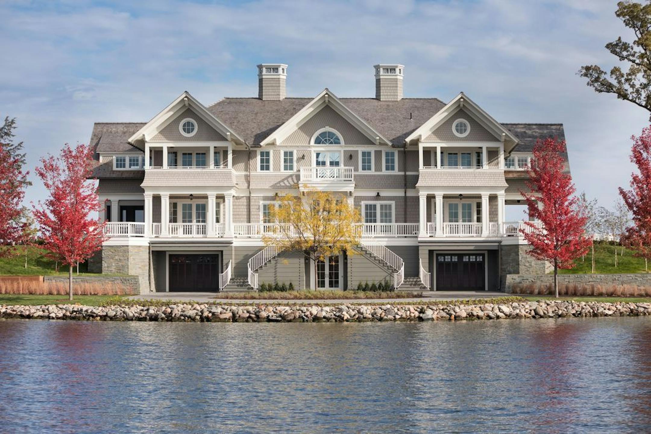 East Coast inspired shingle-style home on a peninsula overlooking Wayzata Bay, by Andrea Swan, Swan Architecture.