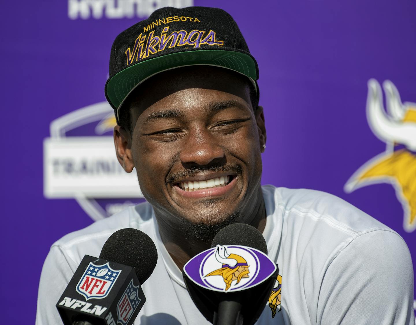 Vikings receiver Stefon Diggs was all smiles after reaching a five-year deal for $72 million Tuesday.