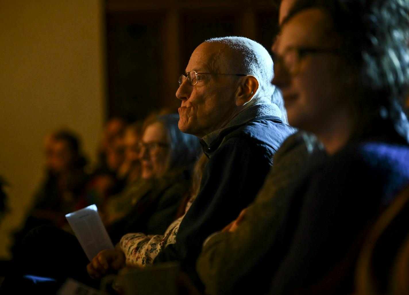 Attendees of Thursday night's performance watch the play from the pews at CityLife Church. ] Aaron Lavinsky &#xa5; aaron.lavinsky@startribune.com When leaders of CityLife Church learned that a 1924 episode of racism in St. Paul that included cross-burnings took place just a few doors away, they sought out ways to foster reconciliation. A first step: they invited the play Not In Our Neighborhood! to perform in the neighborhood that once forced a black couple to endure threats and intimidation. We