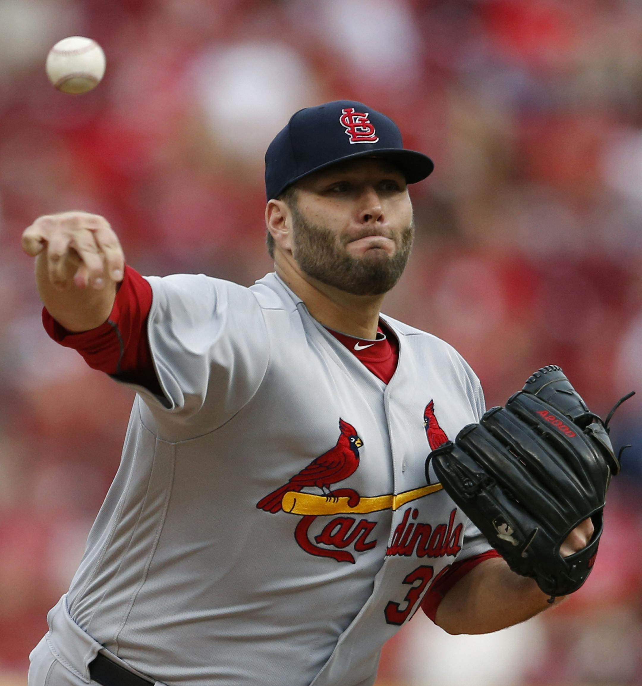 St. Louis Cardinals starting pitcher Lance Lynn (31) throws against the Cincinnati Reds during the first inning of a baseball game, Saturday, Aug. 5, 2017, in Cincinnati. (AP Photo/Gary Landers)