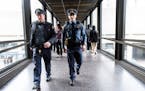 St. Paul Police officer-in-training Eric Hanson, right, and Officer Bruce Schmidt patrolled the skyway in downtown St. Paul on Thursday, Jan. 26, 2017