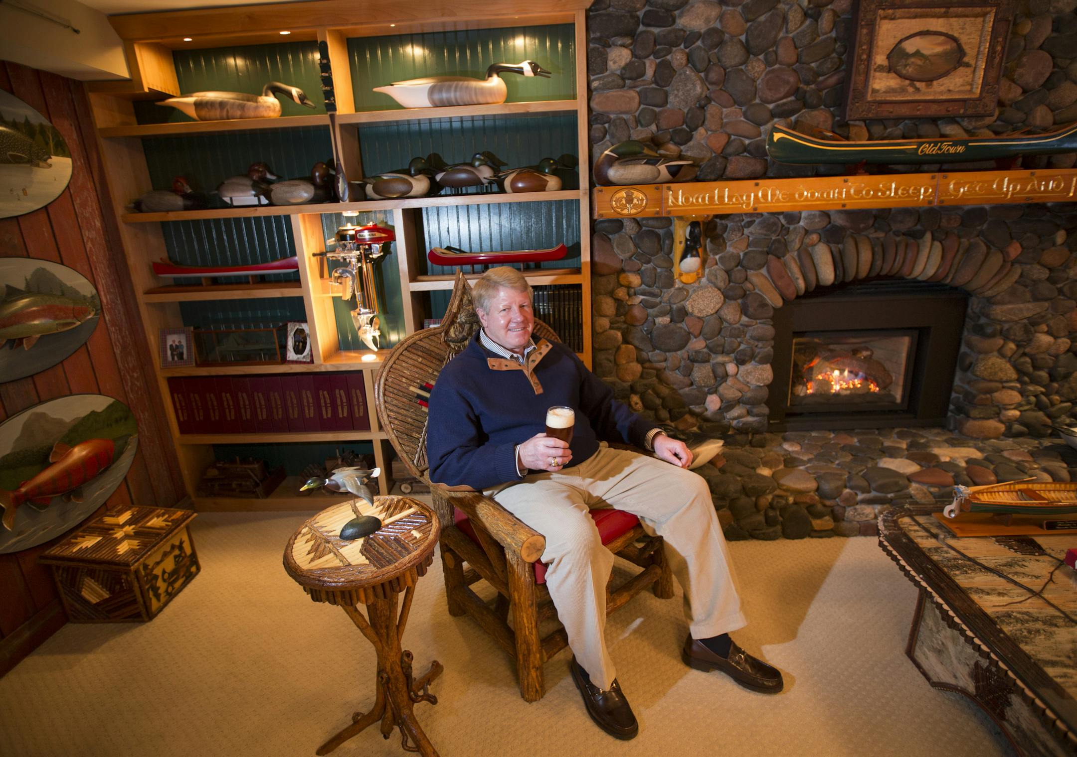 Rod Taylor in his man cave filled with hunting and fishing collectibles.