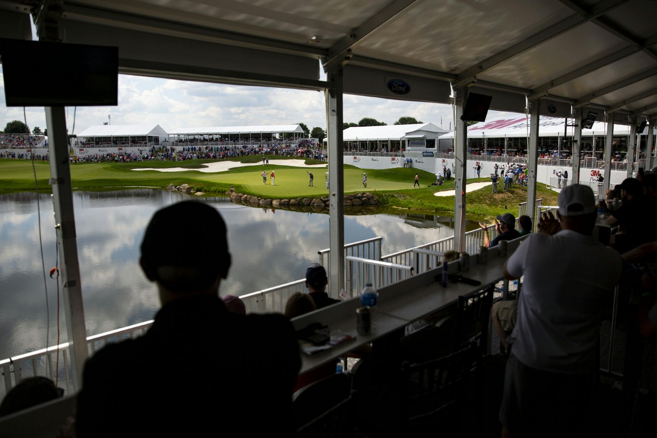 Tom Lehman salutes the crowd after hitting a birdie on the 18th hole. ALEX KORMANN ¥ alex.kormann@startribune.com Competitors for the 3M Open took to the course on Saturday.