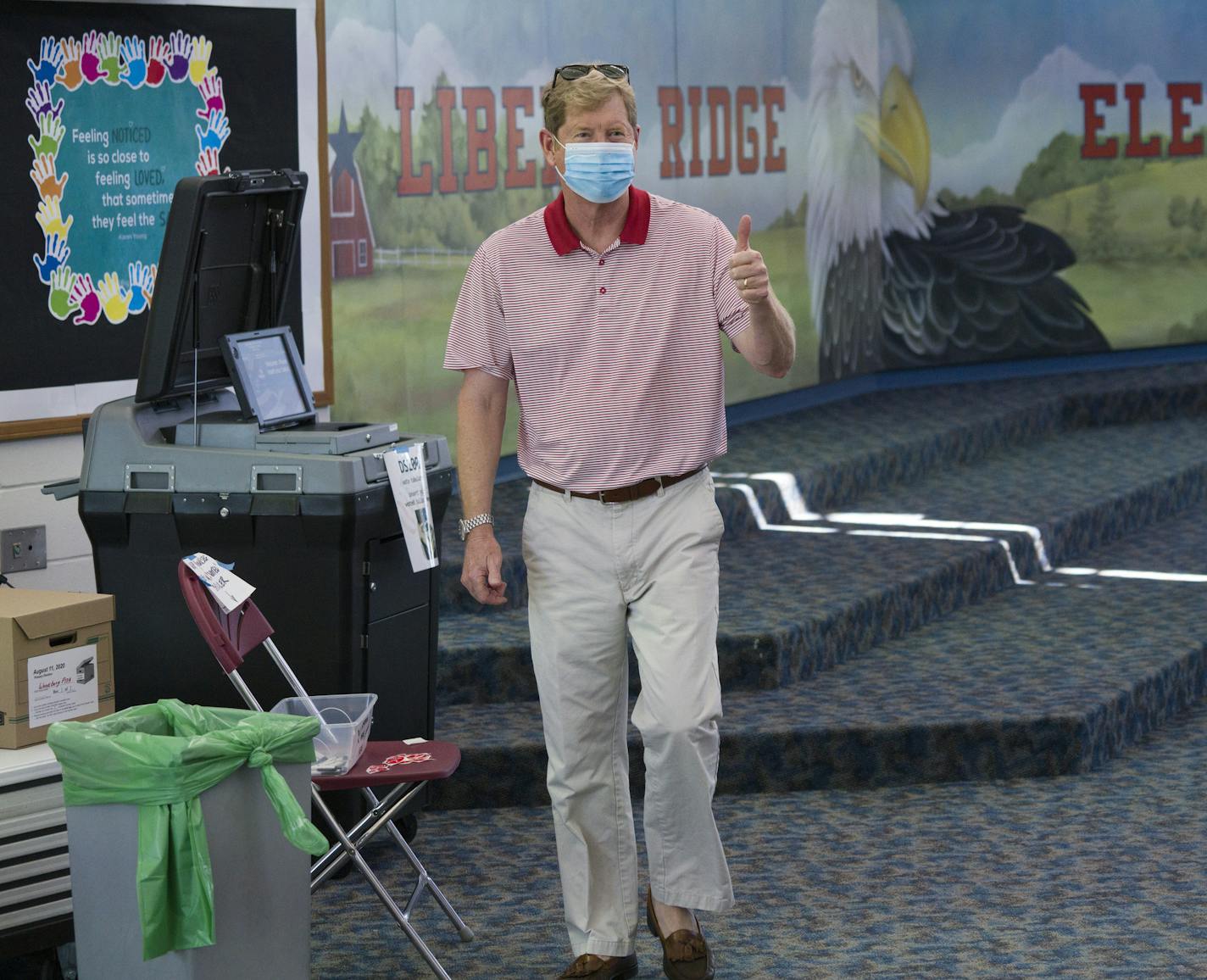 Jason Lewis cast his ballot at Liberty Ridge Elementary School in Woodbury Tuesday afternoon and slapped a "I voted" sticker on his chest after doing so. ] Quick preview of the U.S. Senate race between DFL incumbent Tina Smith and GOP challenger Jason Lewis, a former congressman and radio host whose campaign so far has emphasized his opposition to COVID shutdowns during the pandemic. He's also positioned himself as a champion of law enforcement in the wake of the violent protests following the p