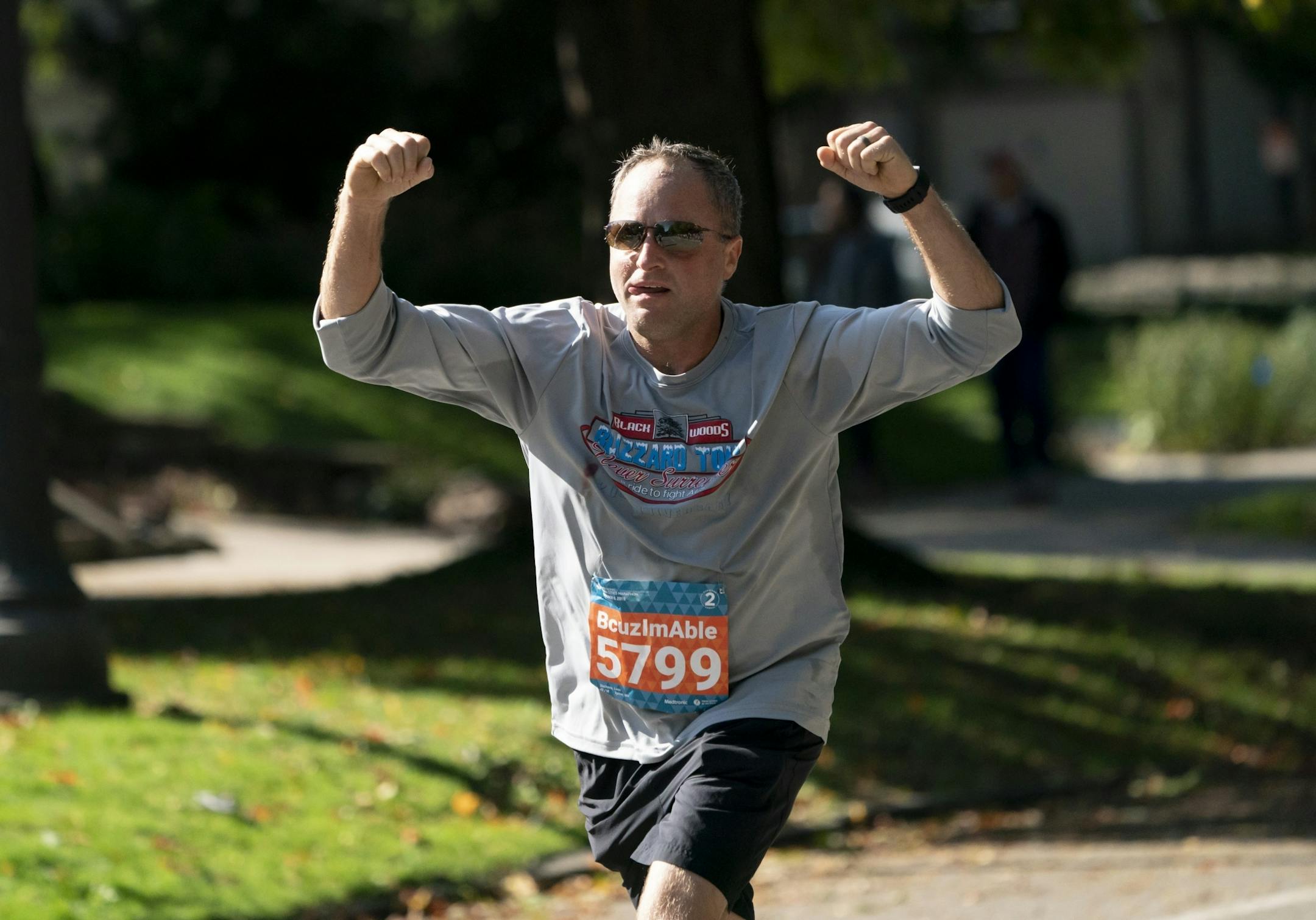 Leon Duchene raised his arms as he came to the final mile of the race.