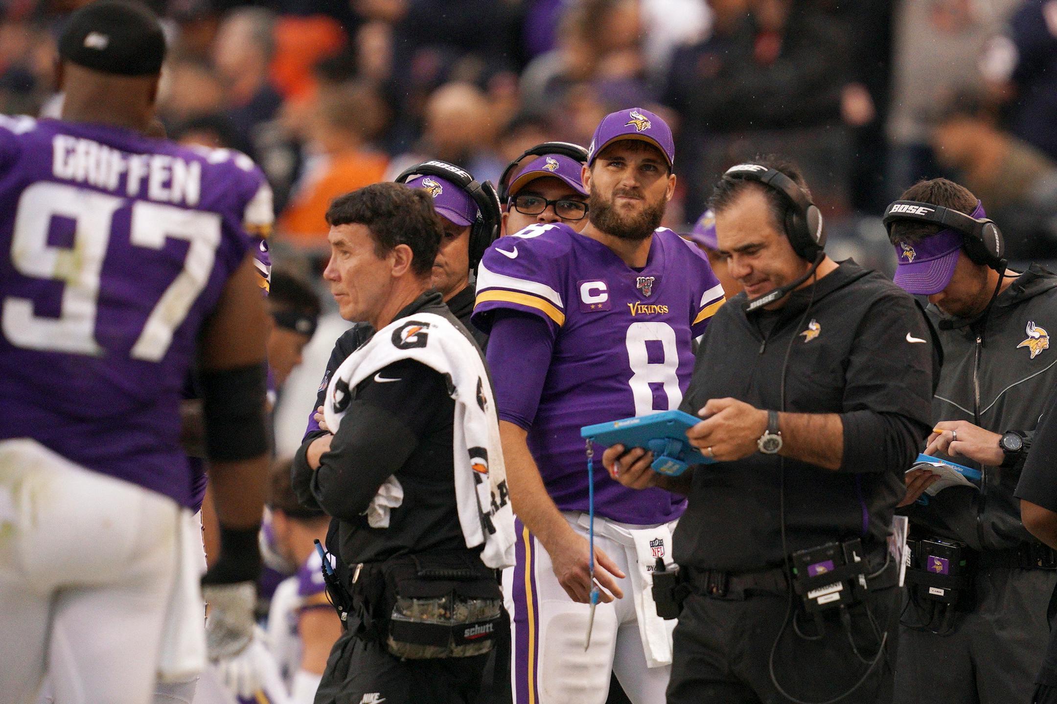 Minnesota Vikings quarterback Kirk Cousins (8) reacted as he looked to the scoreboard from the sidelines late in the fourth quarter of Sunday's 16-6 loss to the Bears.