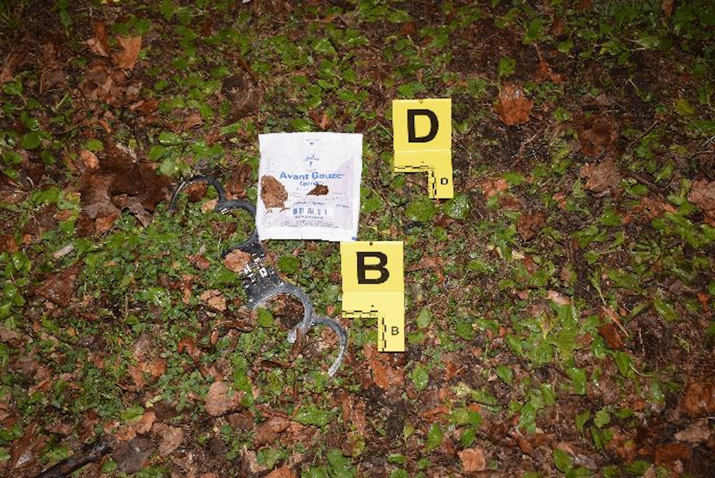 This photo of opened handcuffs on the ground was part of the investigative information released by Hennepin County attorney Mike Freeman.